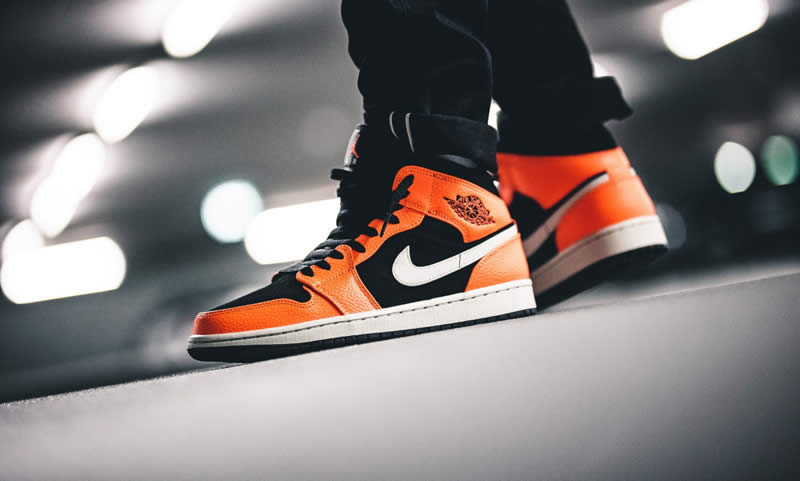 shattered backboard air jordan 1 mid black orange peel on feet